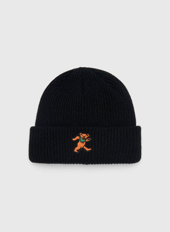 Black ribbed knit Grateful Dead Dancing Bear Felt Patch Ribbed Beanie featuring a felt patch of a dancing orange bear.
