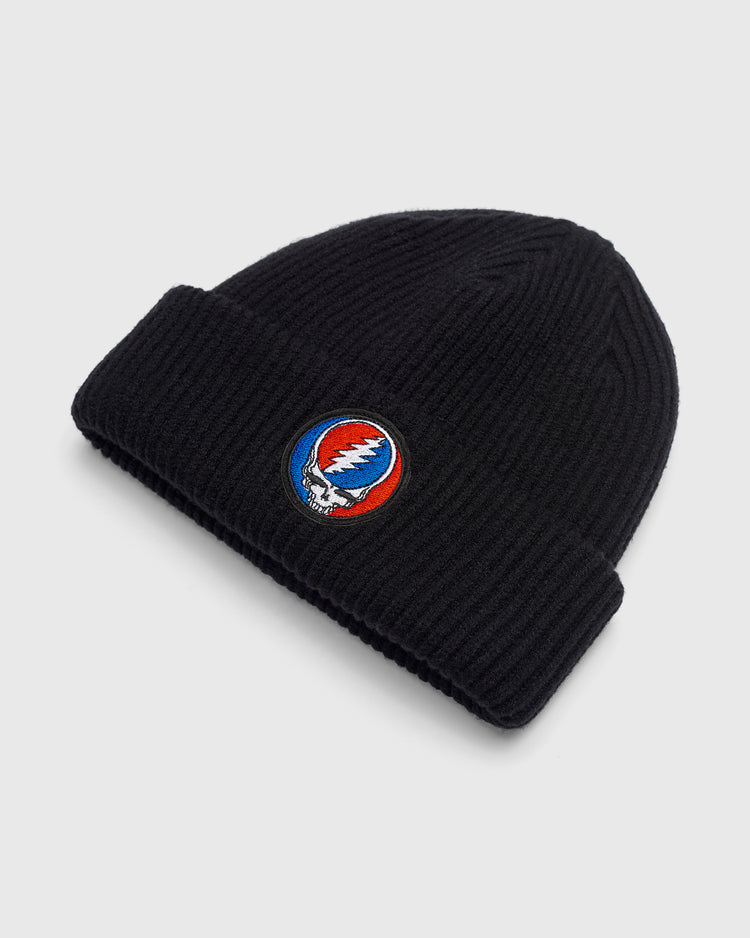 Ebbets Field Grateful Dead Stealie Felt Patch Ribbed Beanie, a black ribbed knit beanie with a circular patch featuring a red, white, and blue skull logo.