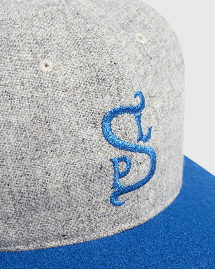 Mystery Caps of Mexico – San Luis Potosi 1926 Wool Ballcap, a grey wool baseball cap featuring an embroidered blue SLP monogram honoring San Luis Potosi Tuneros baseball history.