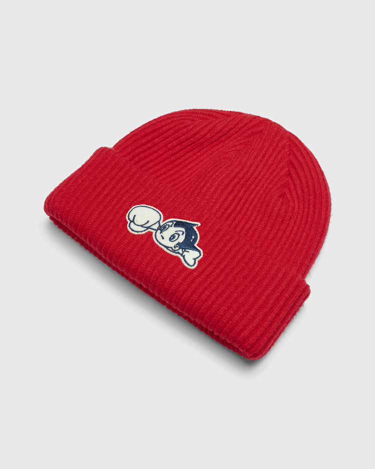 Red ribbed Sankei Atoms Felt Patch Ribbed Beanie with an Astro Boy felt patch on the cuff, inspired by the vintage Sankei Atoms design.