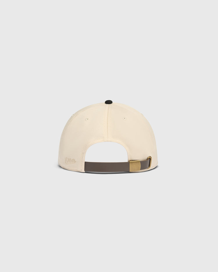 Back view of a cream Ebbets Field Sioux City Ghosts Cotton Twill Ballcap, featuring an adjustable dark strap and brass slide buckle.