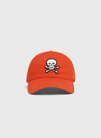Orange Ebbets Field Sioux City Ghosts Washed Cotton Ballcap with a white and black skull and crossbones patch on the front.