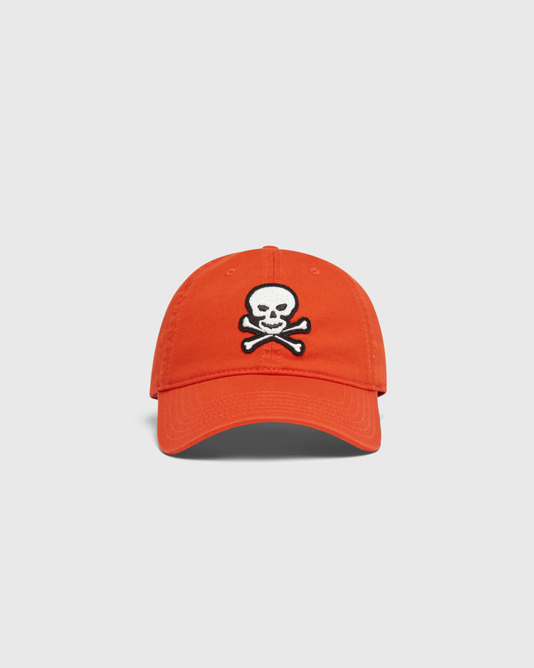 Orange Ebbets Field Sioux City Ghosts Washed Cotton Ballcap with a white and black skull and crossbones patch on the front.