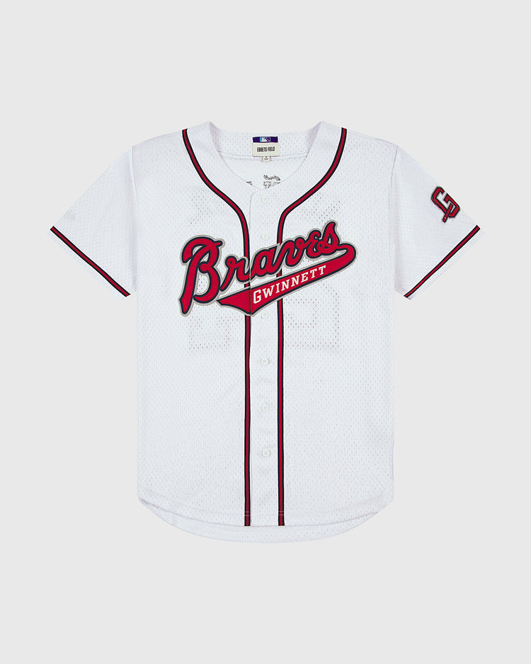 The Ebbets Field Ronald Acuña Jr. Gwinnett Braves Mesh Button-Up Jersey is a white vintage style with red and black trim, Braves in red script, Gwinnett on a red banner, and a logo patch on the left sleeve.
