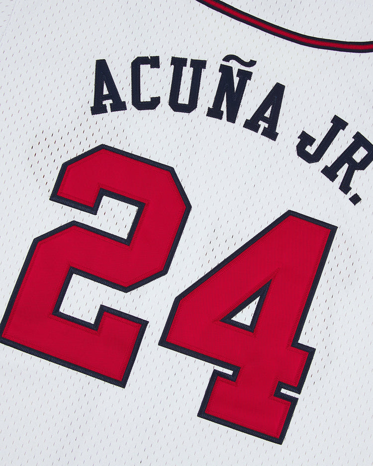 The Ebbets Field Ronald Acuña Jr. Gwinnett Braves Mesh Button-Up Jersey features his name and number 24 in bold red and black on a white mesh, capturing authentic minor league style.