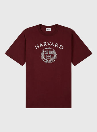 The Ebbets Field HARVARD SS TEE MAR is a maroon short-sleeve T-shirt with HARVARD and the university crest in white on the front, shown against a light gray background.