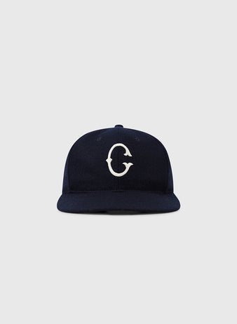 The EFF University of Connecticut 1957 Vintage Ballcap is a navy blue cap with a white G embroidered on the front, shown against a plain light gray background.