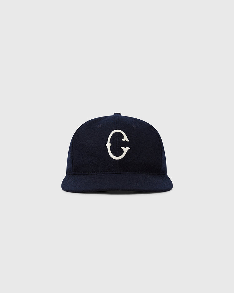 The EFF University of Connecticut 1957 Vintage Ballcap is a navy blue cap with a white G embroidered on the front, shown against a plain light gray background.