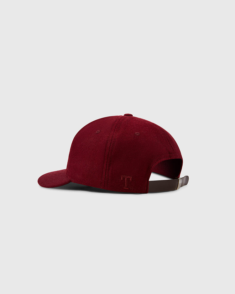 The EFF Texas A&M Aggies Mascot Collegiate Wool Ballcap is a maroon vintage cap with a curved brim, shown from the back. It features an adjustable leather strap and a small embroidered T by the opening on a plain light gray background.