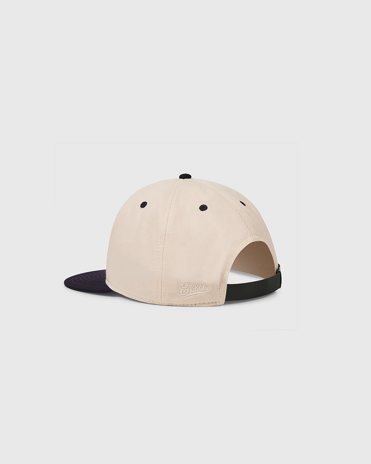 The Ebbets Field Brooklyn Eagles 1935 Cotton Twill Ballcap features a beige crown, black brim, and adjustable rear strap, shown from the back against a plain white background.