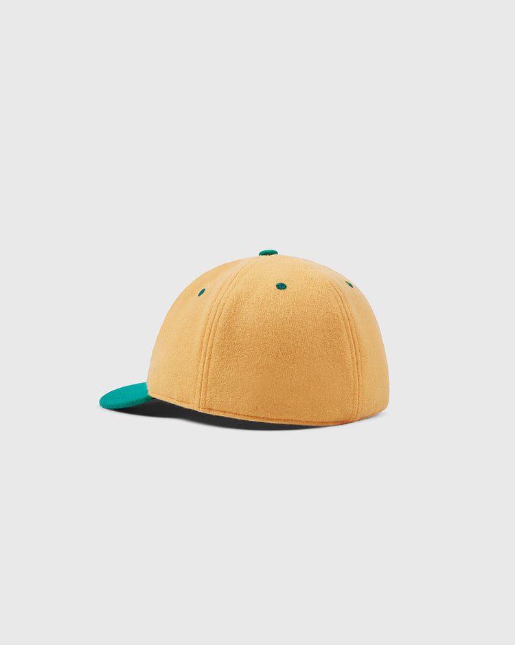 The EFF University of San Francisco Collegiate Wool Ballcap in gold features green eyelets and a green brim, shown on a plain white background.