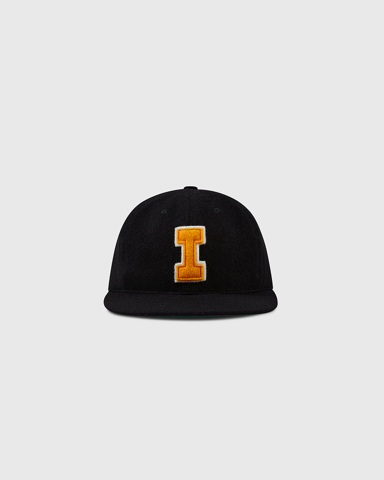 The EFF University of Iowa 1968 Vintage Ballcap is a black wool flat-brim hat with a large yellow I outlined in white on the front, inspired by classic Hawkeyes style and shown against a plain light gray background.