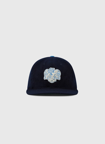 The EFF University of North Carolina Mascot Vintage Ballcap is a navy wool hat with a curved brim and embroidered light blue and white UNC Tar Heels design, shown against a plain light grey background.