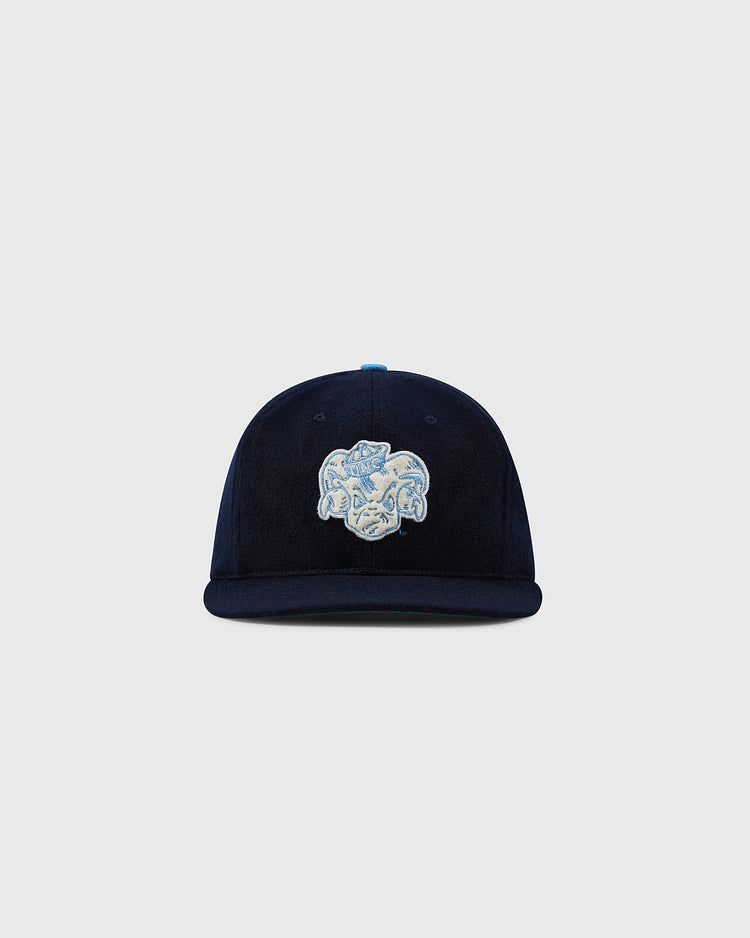 The EFF University of North Carolina Mascot Vintage Ballcap is a navy wool hat with a curved brim and embroidered light blue and white UNC Tar Heels design, shown against a plain light grey background.