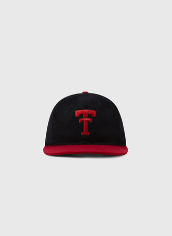 The Texas Tech University 1956 Vintage Ballcap by Ebbets Field Flannels is a black cap with a red brim and bold red T embroidery, shown on a plain light gray background.