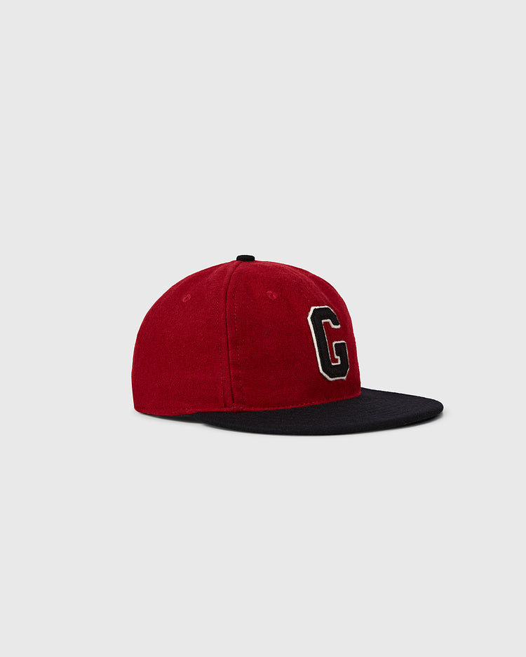 The EFF University of Georgia 1966 Vintage Ballcap features a red crown, black brim, and a bold black-outlined letter G on the front, showcased against a plain gray background.