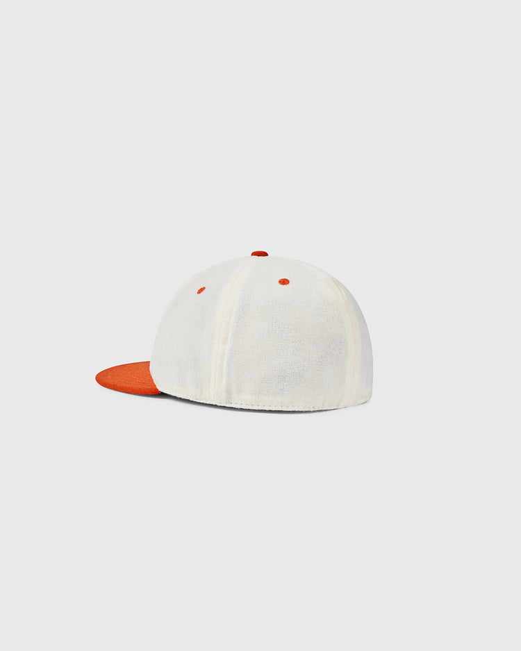 The University of Tennessee Mascot Vintage Ballcap by Ebbets Field Flannels is a white wool baseball cap with an orange brim and eyelets, shown from the back left on a plain light gray background.