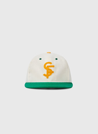 The EFF University of San Francisco Collegiate Wool Ballcap is a vintage-style white hat with a green brim, yellow button, green eyelets, and a yellow embroidered CS logo—an authentic 1947-inspired look.
