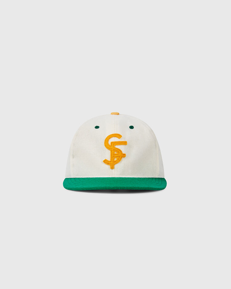 The EFF University of San Francisco Collegiate Wool Ballcap is a vintage-style white hat with a green brim, yellow button, green eyelets, and a yellow embroidered CS logo—an authentic 1947-inspired look.