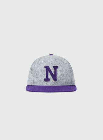 The EFF Northwestern University 1917 Vintage Ballcap features a gray crown, purple brim, and a large embroidered purple N on the front, officially licensed from the College Vault and shown against a white background.