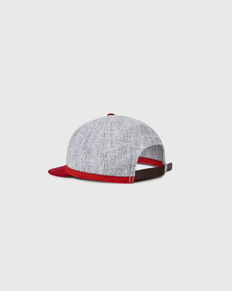 The EFF University of Wisconsin 1931 Vintage 8-Panel Ballcap is shown from the back, highlighting its gray and red wool panels, brown adjustable strap, and red brim against a plain light background.