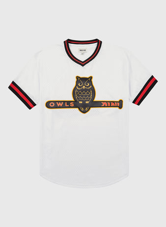 The Ebbets Field Topeka Owls V-Neck Mesh Jersey features white mesh with red and black trim, plus a bold owl-on-bat “OWLS” logo—perfect for fans of the classic minor league team.