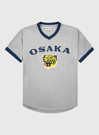 The Ebbets Field Osaka Tigers Mesh V-Neck Jersey features gray mesh, navy trim, OSAKA lettering, and a yellow tiger head—paying homage to Japanese baseball and iconic games at Koshien Field.