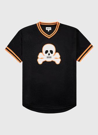 The Ebbets Field Sioux City Ghosts Mesh V-Neck Jersey is a black short-sleeve mesh top with orange and white trim, featuring a bold white skull and crossbones graphic outlined in orange, inspired by the legendary softball team.