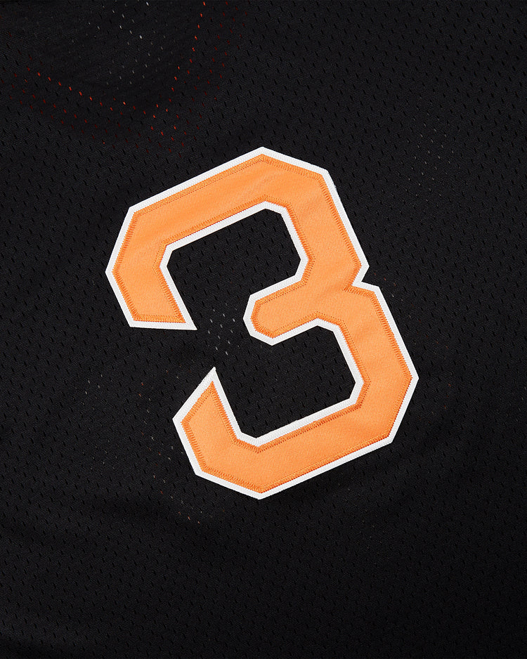 The Ebbets Field Sioux City Ghosts Mesh V-Neck Jersey features a bold orange and white number 3 stitched on black mesh, evoking the iconic retro style of the legendary team.