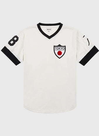 The Ebbets Field Tokyo Giants Mesh V-Neck Jersey features black trim, the number 8 on the right sleeve, and a Tokyo shield patch with red circle—a tribute to Victor Starffin and Japanese Baseball League heritage.