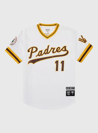The Ebbets Field Ozzie Smith Walla Walla Padres Mesh V-Neck Jersey features white mesh, yellow and brown trim, Padres script front, #11, and sleeve patches honoring Ozzie Smith and the Cooperstown Collection.