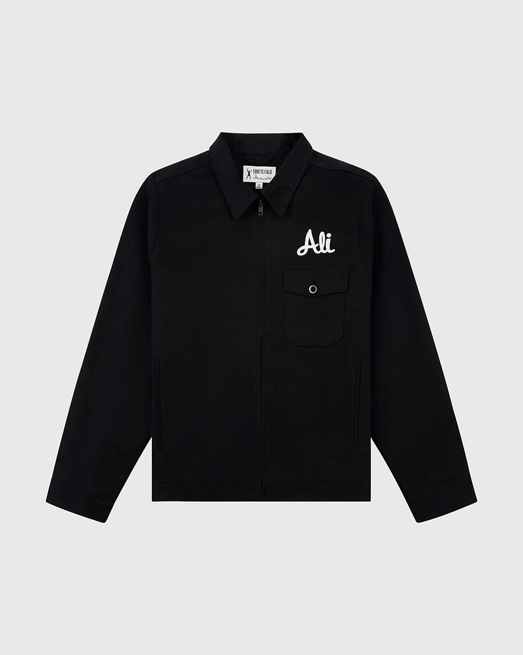A black Ebbets Field Muhammad Ali Training Camp Cotton Grounds Crew Jacket with a pointed collar, buttoned chest pocket, and 