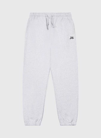 Ebbets Field Muhammad Ali Embroidered Heavyweight Cotton Terry Sweatpants in light gray feature an elastic waistband, drawstring, side pockets, elastic cuffs, and a black “Ali” logo on the left thigh. Inspired by classic boxing training gear.