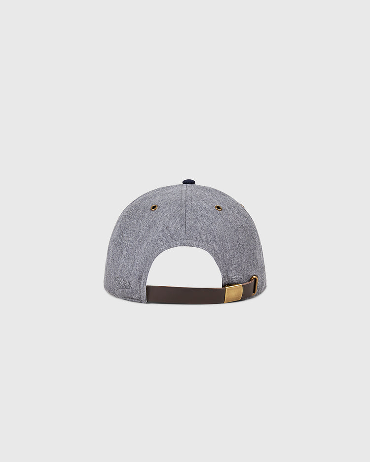 The Ebbets Field Hiroshima Carp Cotton Twill Ballcap in gray is shown from the back, featuring a brown adjustable strap with a gold buckle and side ventilation eyelets. Set against a plain light background, it channels classic baseball team style.