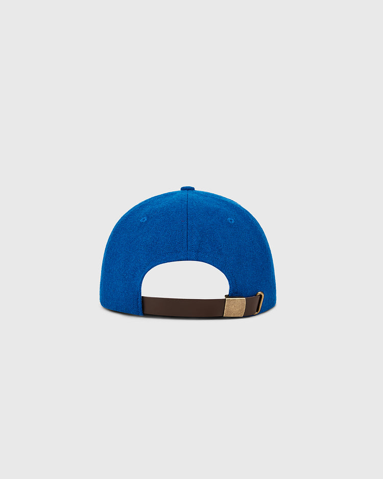The Ebbets Field New York Mets 1962 MLB Authentic Wool Ballcap, shown from the back with a brown adjustable strap and gold clasp on a light gray background. From the Decade of Change Collection.