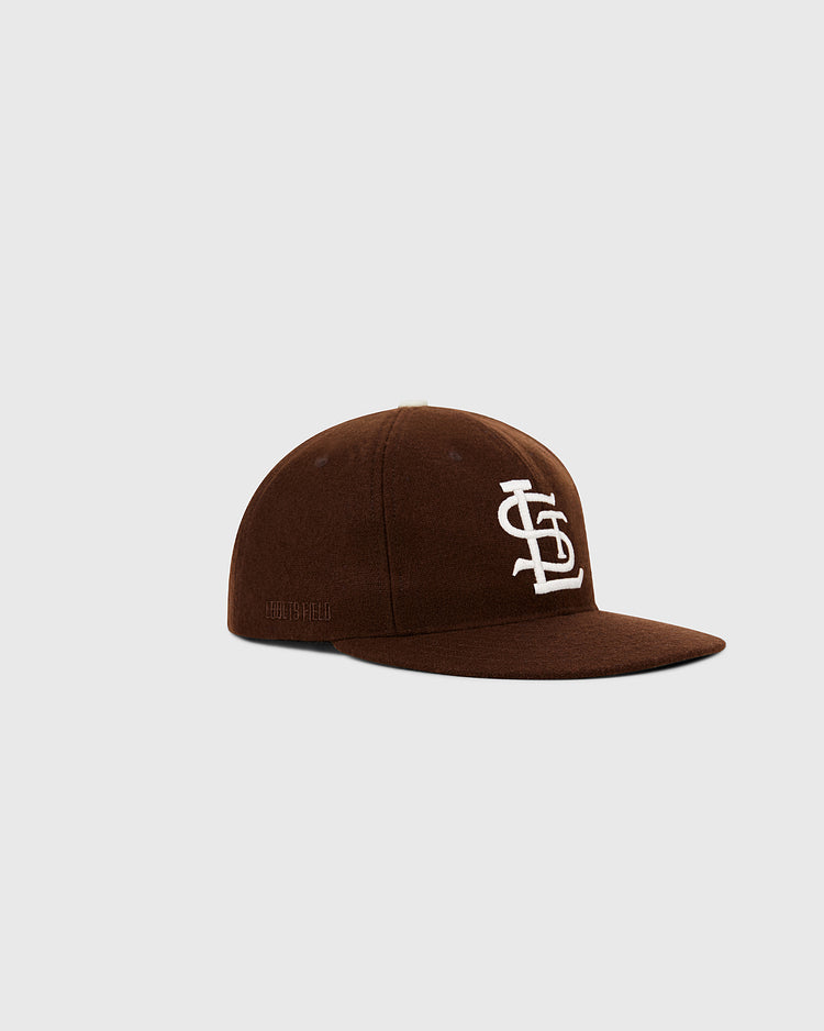 The Ebbets Field St. Louis Browns 1953 MLB Authentic Wool Ballcap features white interlocking letters on brown wool and is shown on a light gray background.