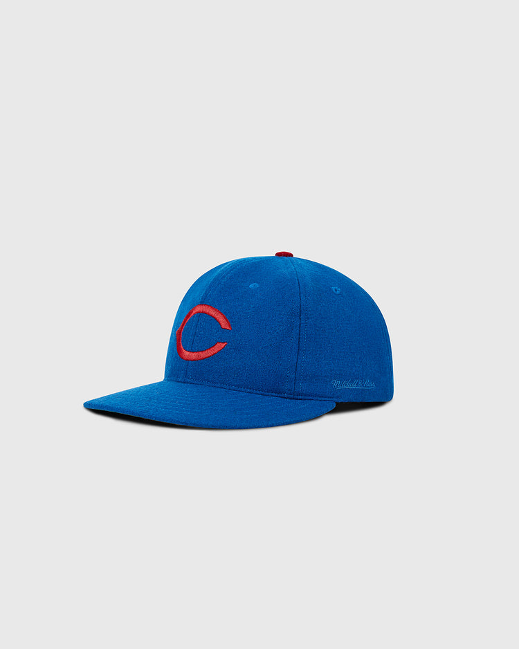 The Ebbets Field Chicago Cubs 1956 MLB Authentic Wool Ballcap features a flat brim, visible stitching, and a blue design with a red outlined 