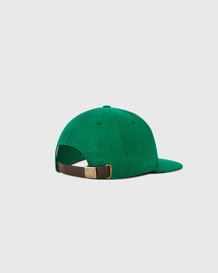 The Ebbets Field Kansas City Athletics 1963 MLB Authentic Wool Ballcap is green, shown from the back with a brown adjustable strap and brass buckle, set against a light gray background.