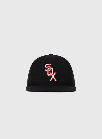 The Ebbets Field Chicago White Sox 1959 MLB Authentic Wool Ballcap is a black flat-brim hat with a white and red outlined SOX logo on the front, shown against a plain light gray background.