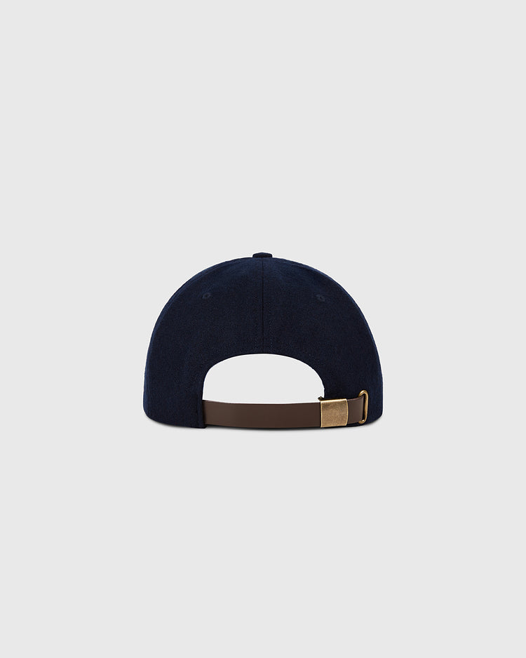 The Ebbets Field Detroit Tigers 1958 MLB Authentic Wool Ballcap, shown from the back in navy wool, features a brown adjustable strap with brass buckle. Part of the Decade of Change Collection, photographed on a plain light gray background.