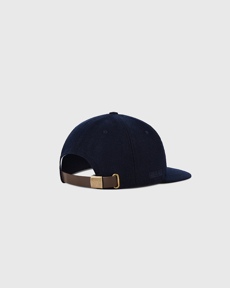 The Detroit Tigers 1958 MLB Authentic Wool Ballcap by Ebbets Field is shown from the back, featuring a brown adjustable strap with a gold buckle. Part of the Decade of Change Collection, it’s set against a light gray background.