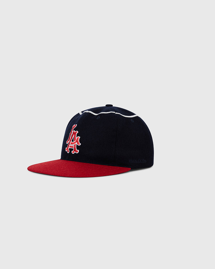 The Ebbets Field Los Angeles Angels 1961 MLB Authentic Wool Ballcap features a navy crown, red brim, and white/red 