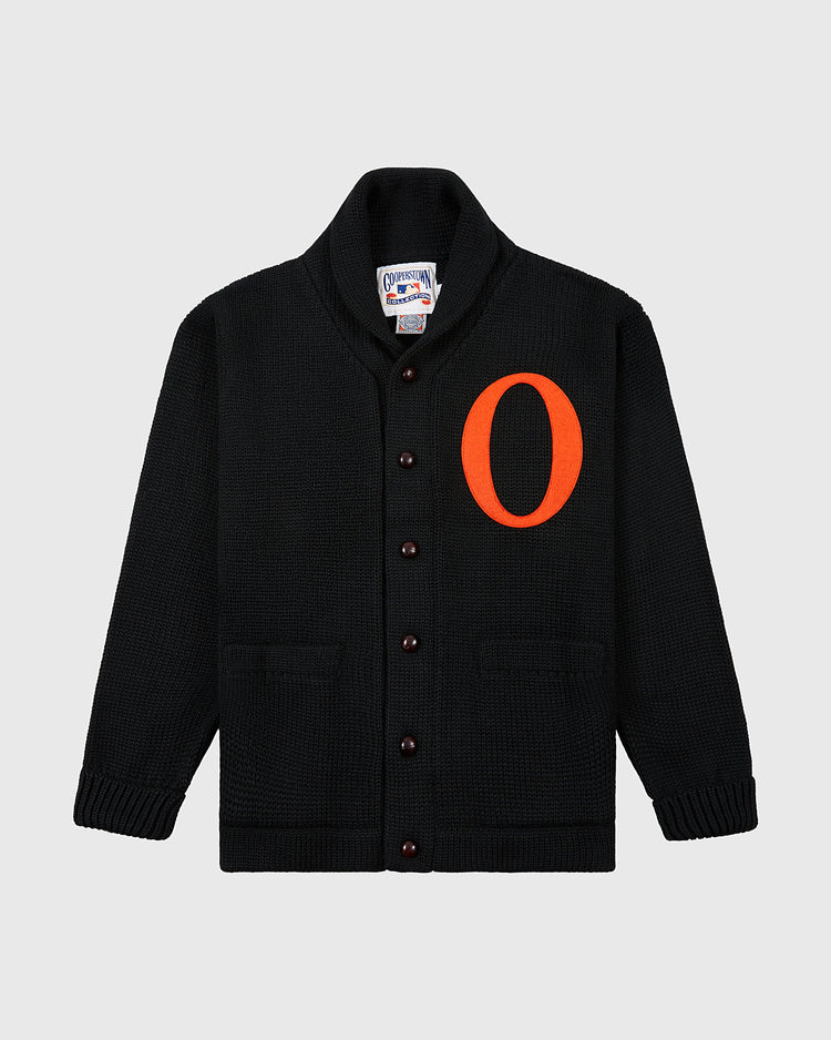 The EFF Baltimore Orioles 1901 Wool Shawl Collar Sweater is a black button-up with front pockets and a large orange 