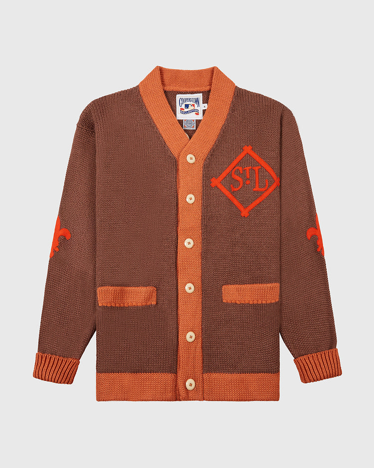 The EFF St. Louis Browns 1909 Wool Cardigan Sweater features a brown and orange vintage baseball design with tan buttons, orange trim and pockets, STL diamond chest patch, and fleur-de-lis accents inspired by the original 1909 style.