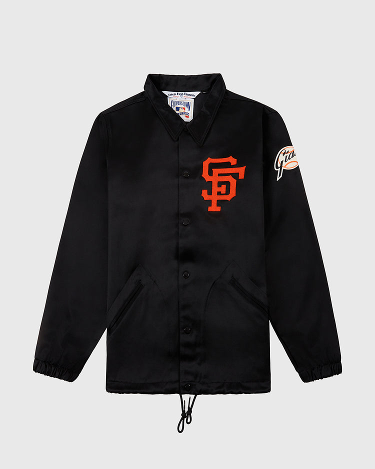 The EFF San Francisco Giants 1958 Satin Windbreaker Jacket features a black button-up design with an orange SF logo on the chest, Giants script on the sleeve, front pockets, and a drawstring hem—perfect for vintage team spirit.