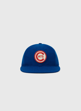 The EFF Fort Worth Cats 1959 Authentic Wool Ballcap is a blue cap featuring a red and white circular 