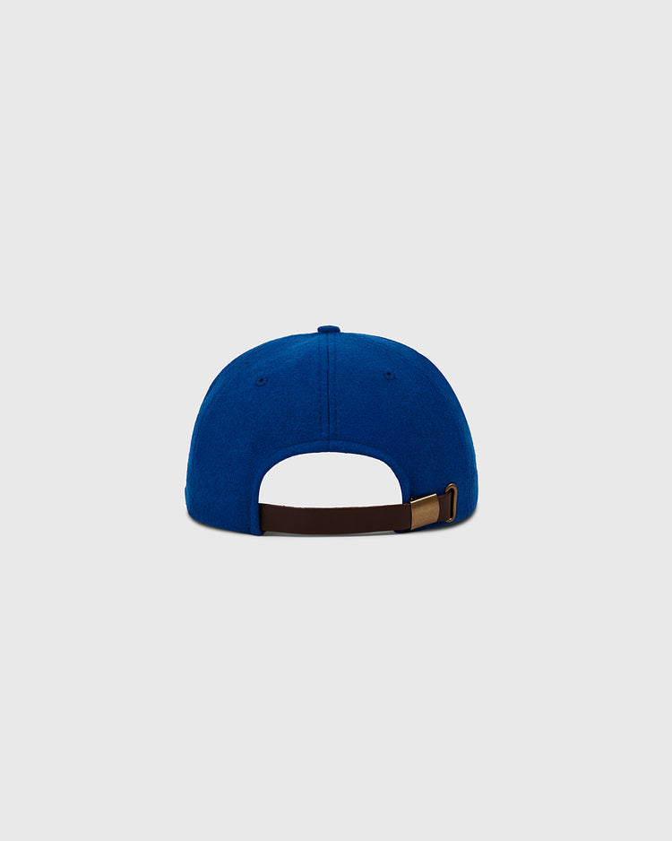 The EFF Fort Worth Cats 1959 Authentic Wool Ballcap is shown from the back, highlighting its brown adjustable strap with metal buckle—classic Texas League style—set against a plain light gray background.