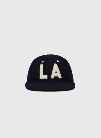The EFF Los Angeles (PCL) 1954 Authentic Wool Ballcap features a navy blue wool build with bold white 