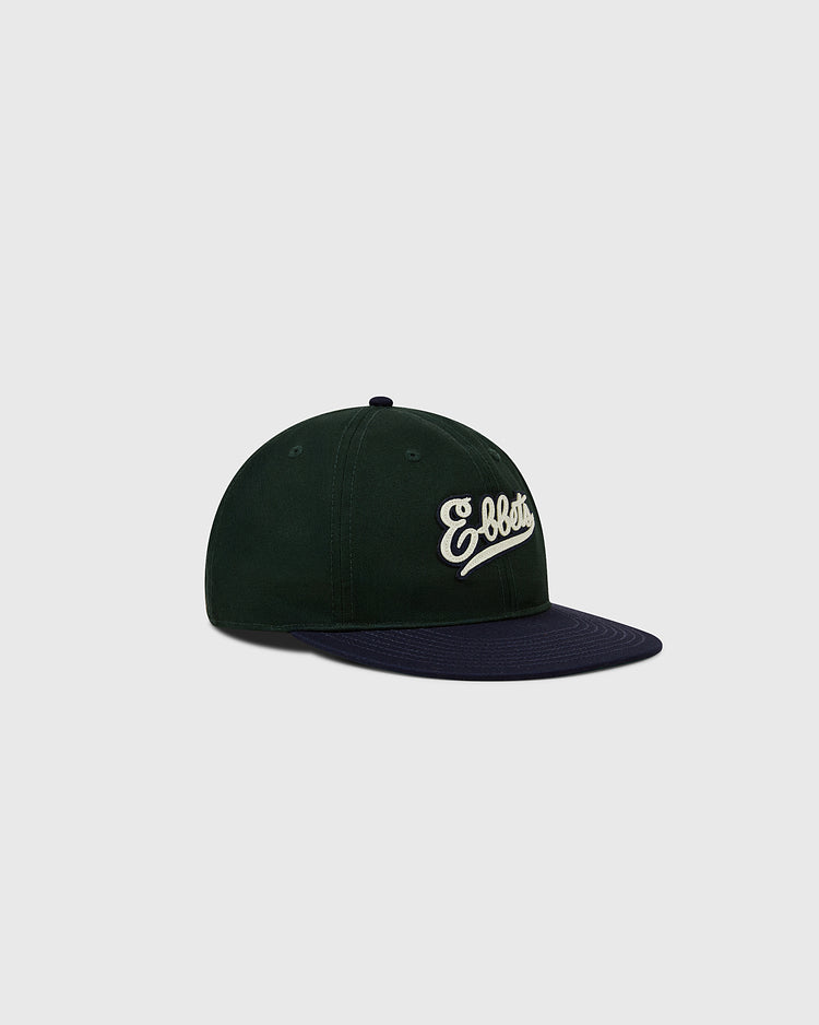 The Ebbets Field Flannels Ebbets Felt Script Cotton Twill Ballcap features dark green cotton twill, a dark blue brim, and white 