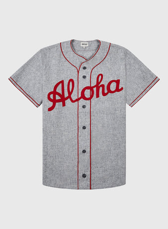 The Ebbets Field Aloha 100th Infantry 1942 Authentic Wool Road Baseball Jersey features gray wool, red piping, and the classic Aloha script logo across the chest, inspired by the famed Aloha Team and 100th Infantry Battalion.
